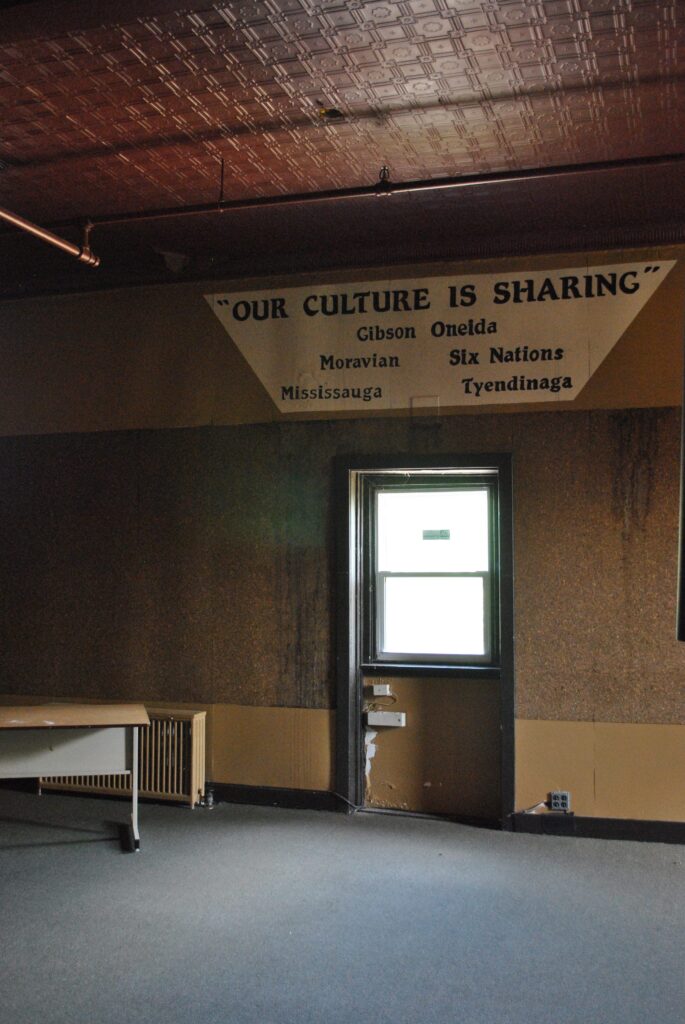 Originally the girls' dormitory, this space bears messages from its time as a music studio.